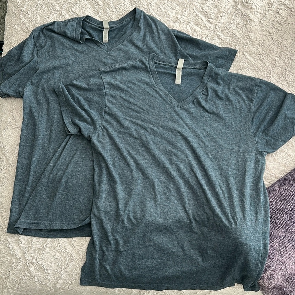 2 used men’s V neck tees